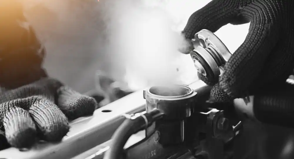 Always use gloves while opening the radiator cap to avoid burns due to the hot steam blowing our from the radiator neck